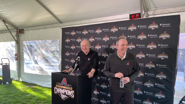 Ken Kendrick and Derrick Hall address media